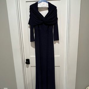 This is a gorgeous couture Theia formal gown. Midnight blue with subtle sparkle.